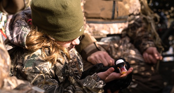 Hunter holding a waterfowl