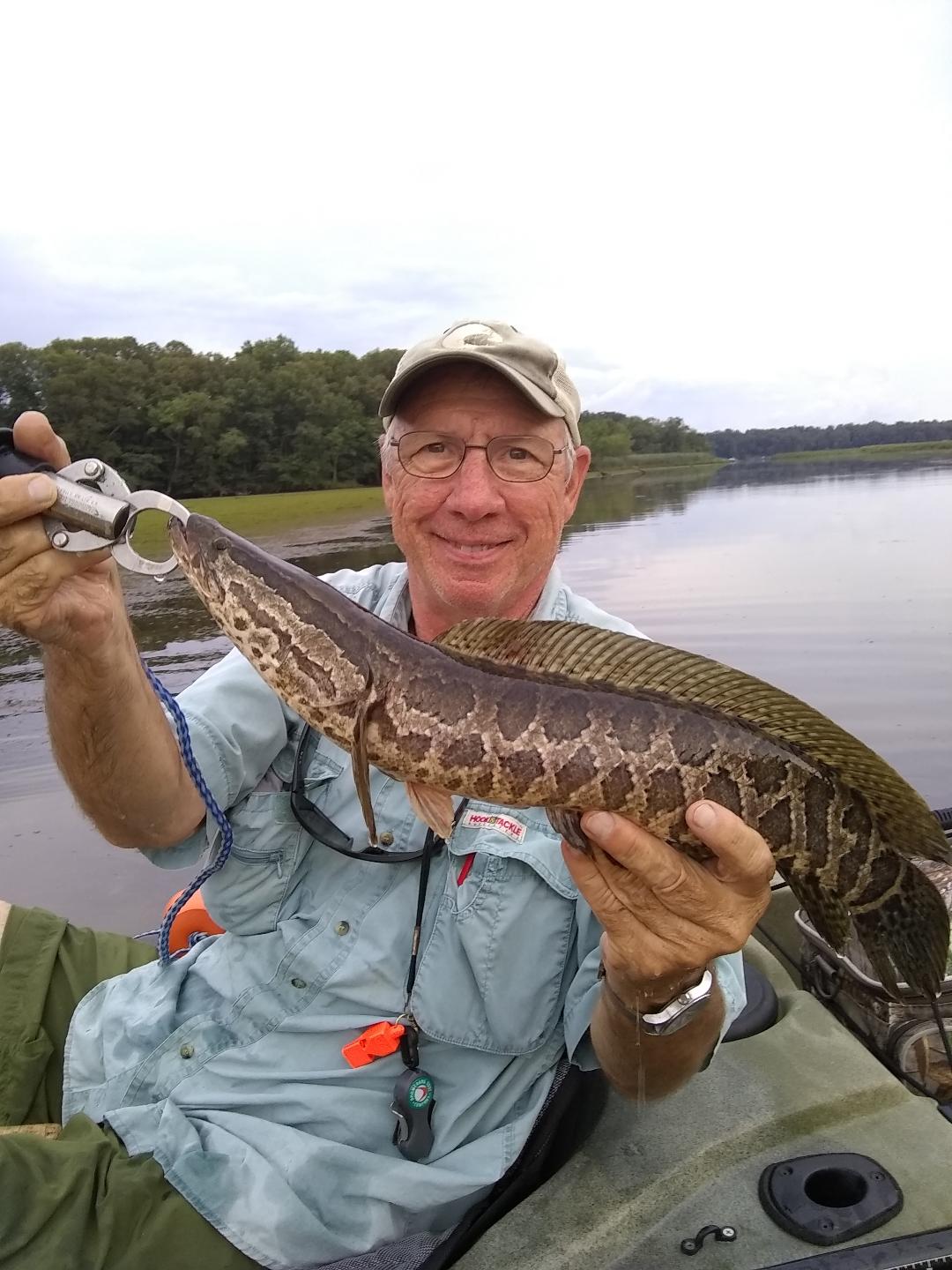 Tim with Snakehead-1.jpg