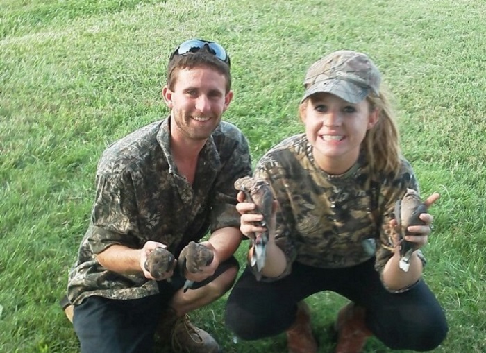 Two dove hunters in camouflage